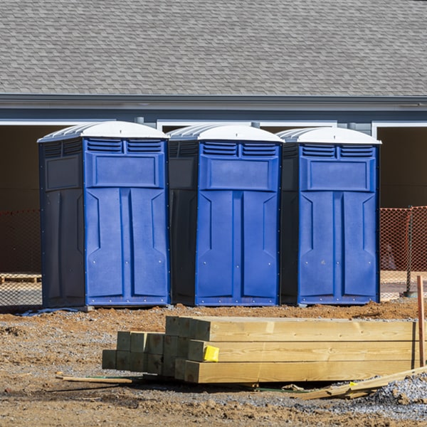 how often are the portable restrooms cleaned and serviced during a rental period in Richland